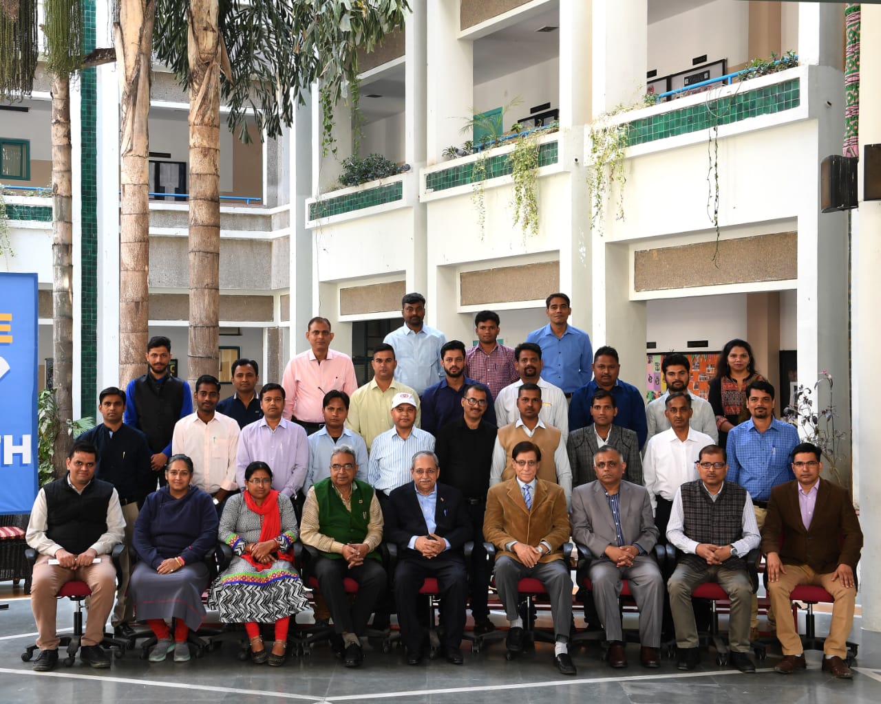 A group photograph of participants along with Kapil Kaul and BIMTECH Director - Dr H Chaturvedi follows.
