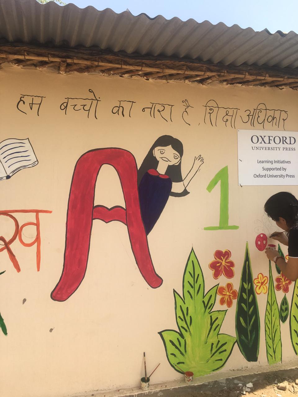 Oxford University Press employees paint a slum school 1 India CSR