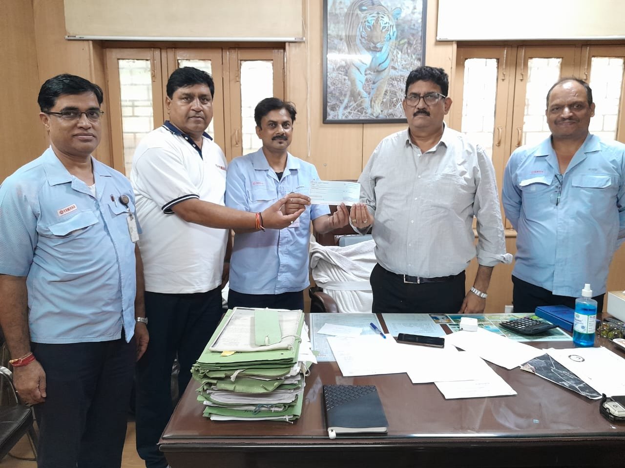 Nepal Singh, Vice President, Manufacturing, India Yamaha Motor, and Mr. Sudesh Bhati, Union President, handed over a demand draft of Rs 10 lakhs to Mr. Pramod Srivastav, Divisional Forest Officer, Gautam Budh Nagar.