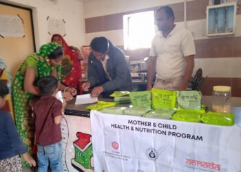 Fortified Food Mixes being distributed at the Aanganwadi Centre in Jamnagar District of Gujarat