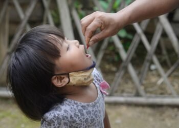 A child is being given a dose of Vitamin A under the collaboration between Vitamin Angels India and the National Health Mission, Nagaland