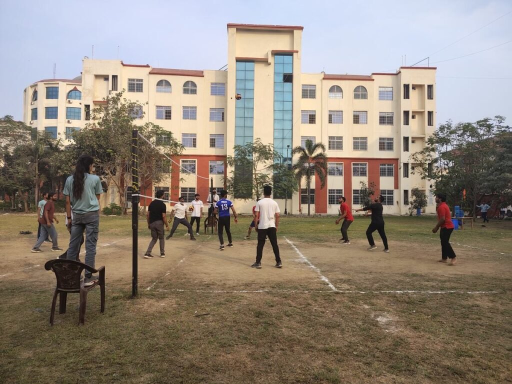 CIMP Hosts “SPARDHA 2025”: A Thrilling Showcase of Sportsmanship and Competition 6 a group of people playing volleyball in a field