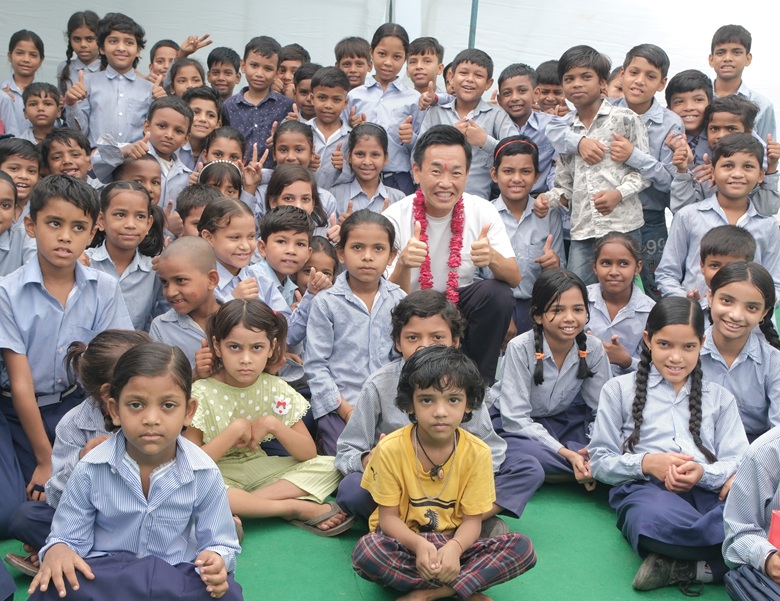 CSR Drive: FUJIFILM India Uplifts 600+ Students in 2 Haryana Schools 1 CSR in India - Koji Wada, Managing Director, FUJIFILM India with school kids at MG Road, Gurugram in India