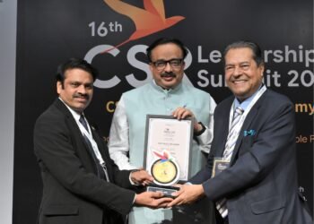 Award being Presented by Dr. Bhaskar Chatterjee and Rusen Kumar for Transformative Contributions to Education, Governance, and Rural Development.