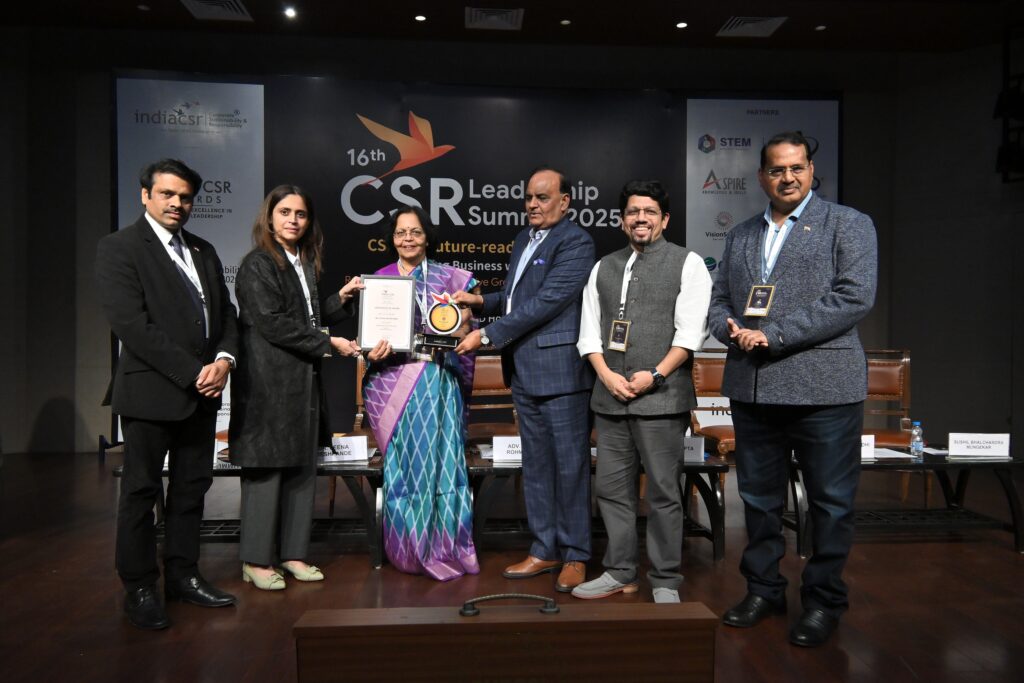 Dr. Leena Deshpande, Head of CSR at Bharat Forge Limited, being honoured with the “India CSR Person of the Year” award. Photo © India CSR