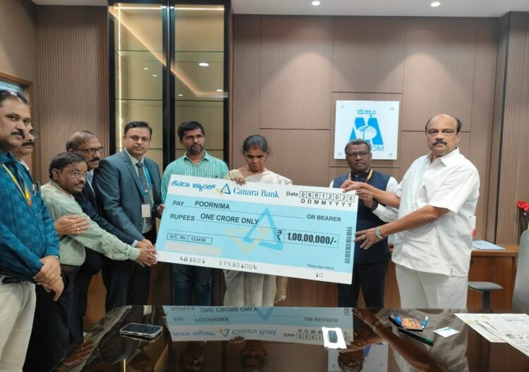 Canara Bank Hands Over Cheque of Rs 1 Cr to Family of Deceased MESCOM Employee
