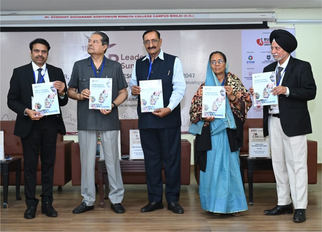 STEM Learning Social Enterprise Newsletter 2026 revealed by Hon’ble Dr. Bhaskar Chatterjee, Father of Indian CSR and Sustainability, Chairman, National Sustainability Reporting and Disclosure Standards Committee, Bureau of Indian Standards; Dr. Jawahar Surisetti, Hon’ble Vice Chancellor, Rungta International Skills University; Santosh Rungta, Hon’ble Chancellor, Rungta International Skills University; Swaran Singh, IAS (Retd.), Chairman and CEO, TVS Srinivasan Services Trust; Padma Shri Phoolbasan Bai Yadav, Founder, Maa Bambleshwari Janhitkari Samiti; and Rusen Kumar, Founder and Editor, India CSR, at Rungta College Campus, Bhilai.