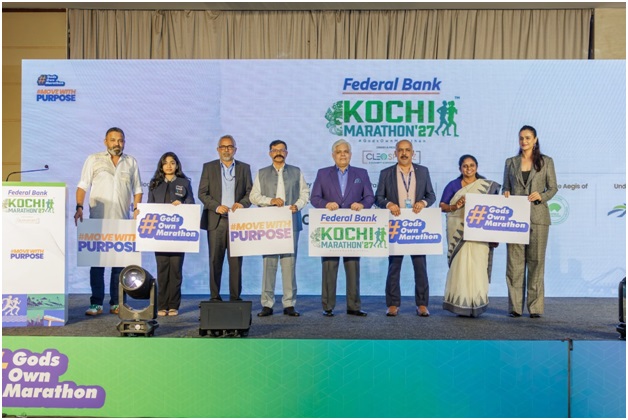 Federal Bank Kochi Marathon 2027 Announced, Vidarsha K. Vinod Honoured 1 Justice Devan Ramachandran and Mayor Adv. V.K. Minimol launch the 5th Federal Bank Kochi Marathon with Vidarsha K. Vinod and other dignitaries.